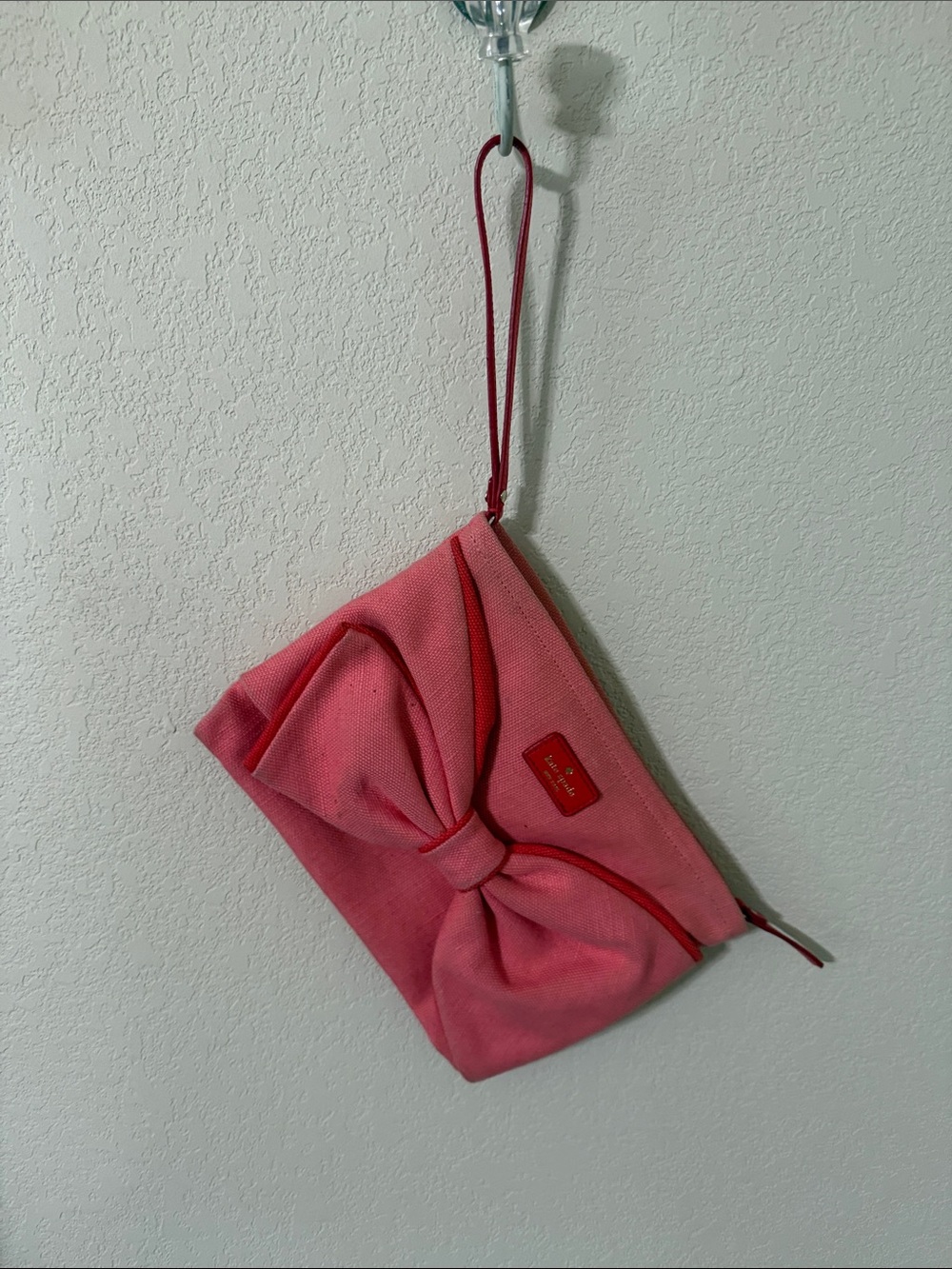 kate spade Pink Bow Wristlet with Red Trim